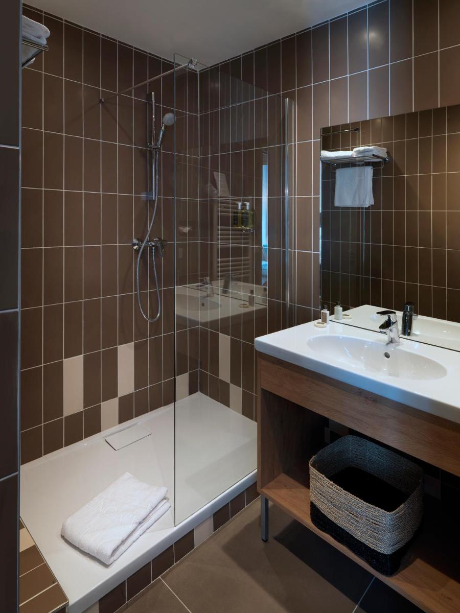 Salle de bains dans l'établissement Hôtel Beau Site Talloires B SPA