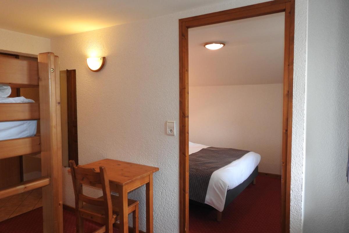 Un ou plusieurs lits dans un hébergement de l'établissement Hôtel Belalp