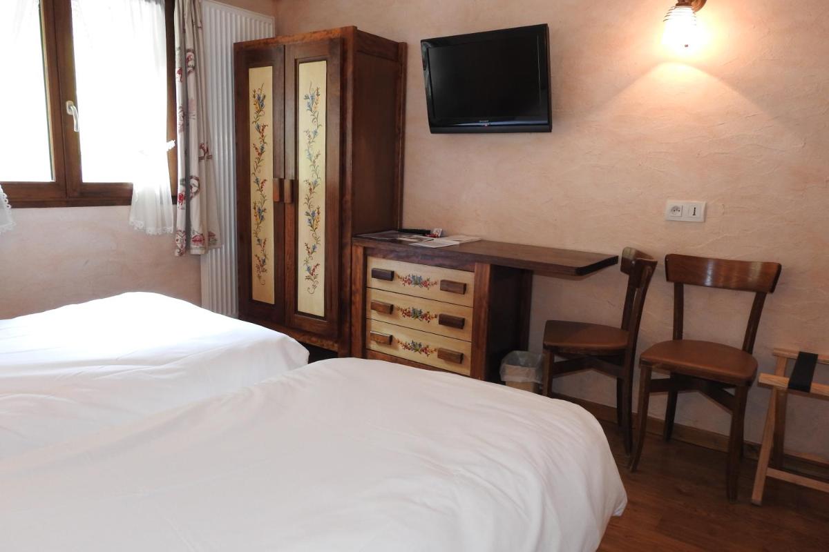 Un ou plusieurs lits dans un hébergement de l'établissement Hôtel Belalp