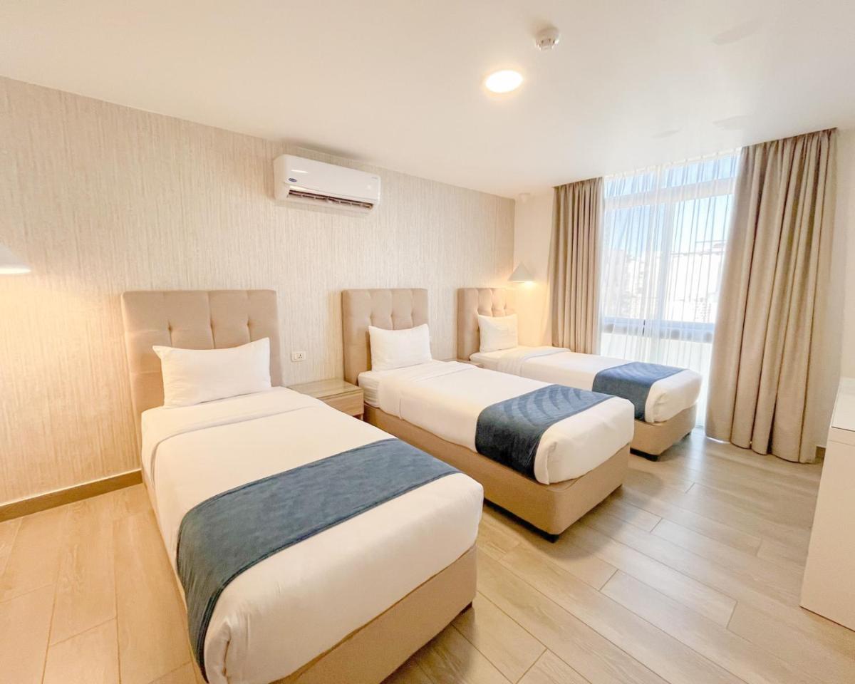 Red Carpet Hotel & Suites - Housity
