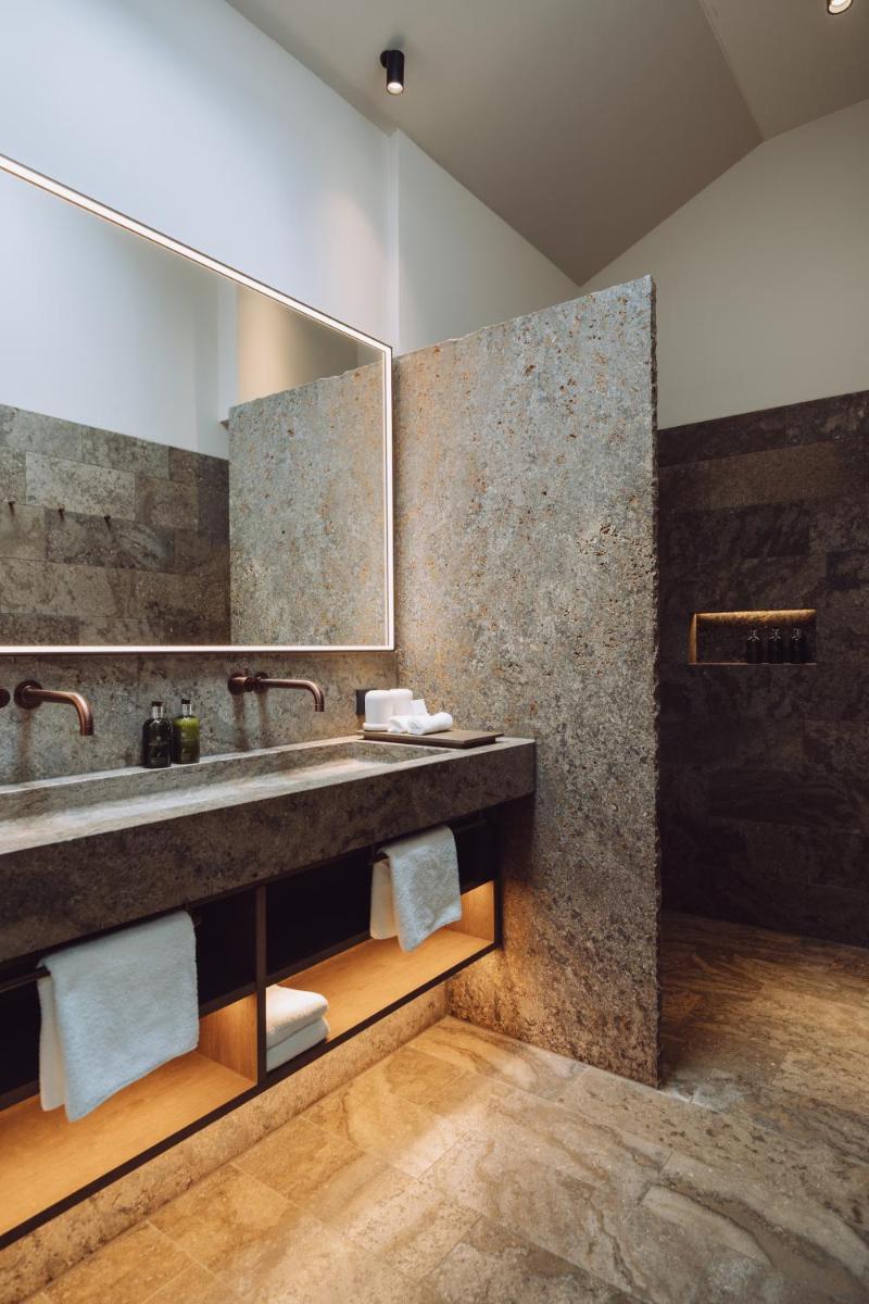 Ein Badezimmer in der Unterkunft Parkhotel Egerner Höfe