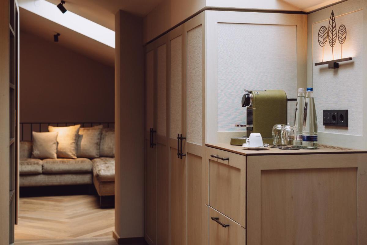 Ein Sitzbereich in der Unterkunft Parkhotel Egerner Höfe