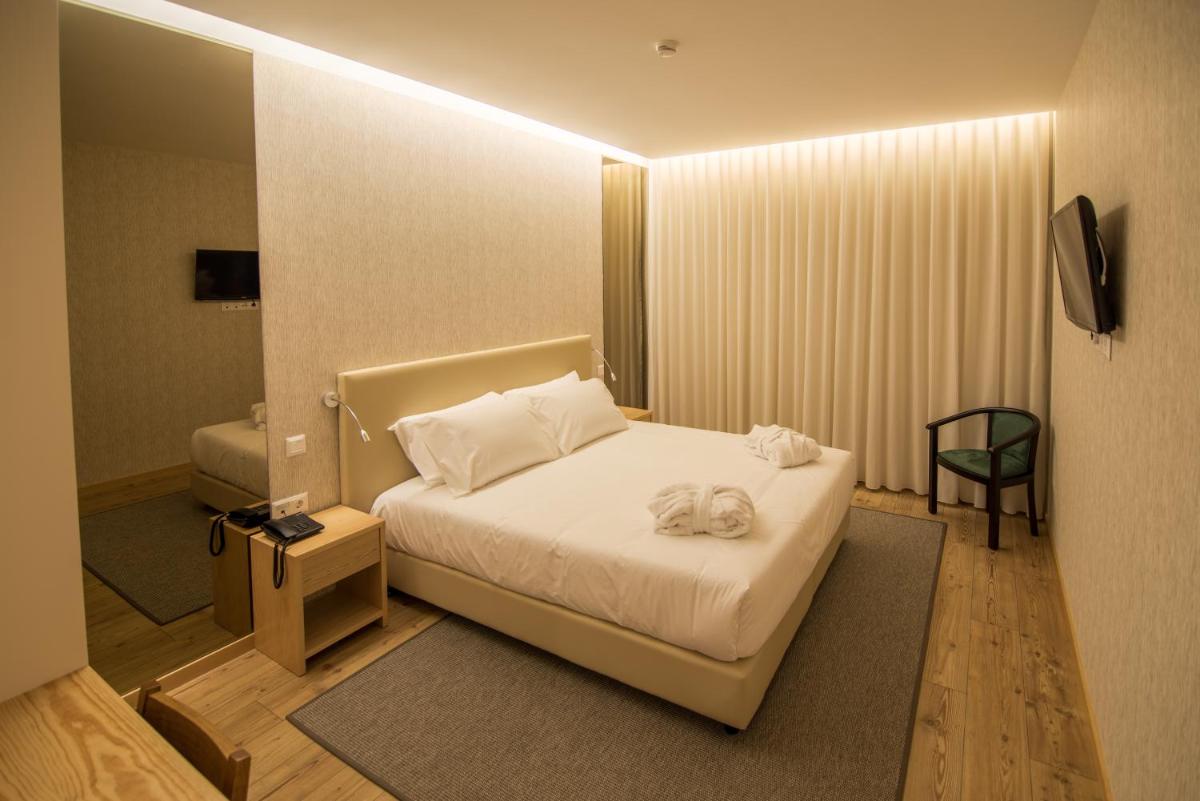 Uma cama ou camas num quarto em LAM Hotel Celorico de Basto