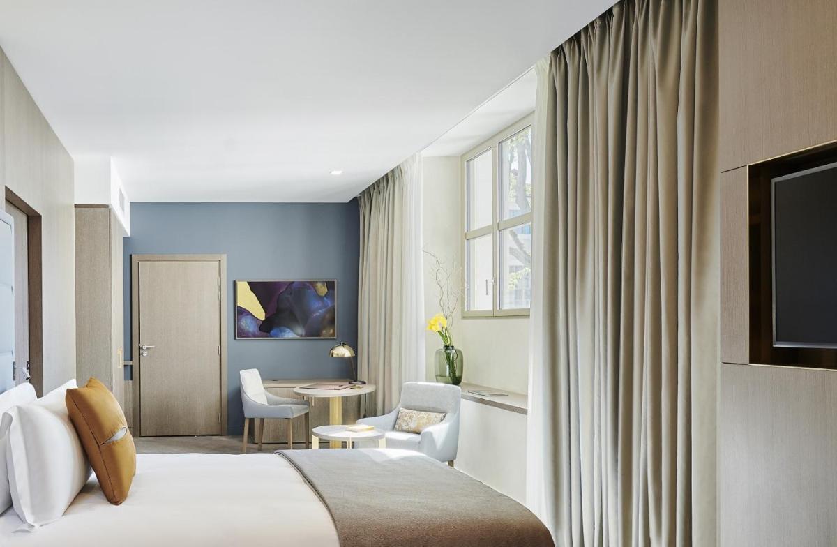 Un ou plusieurs lits dans un hébergement de l'établissement InterContinental Lyon - Hotel Dieu by IHG