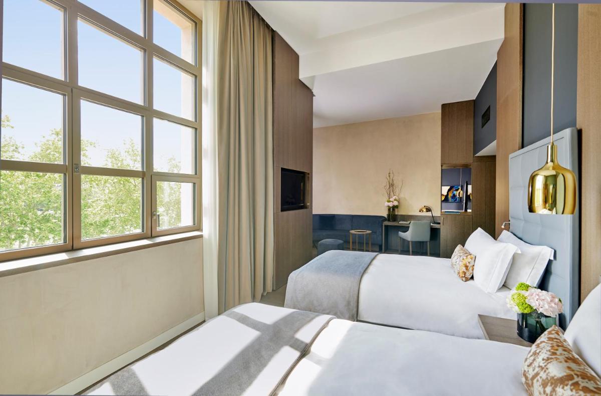 Un ou plusieurs lits dans un hébergement de l'établissement InterContinental Lyon - Hotel Dieu by IHG