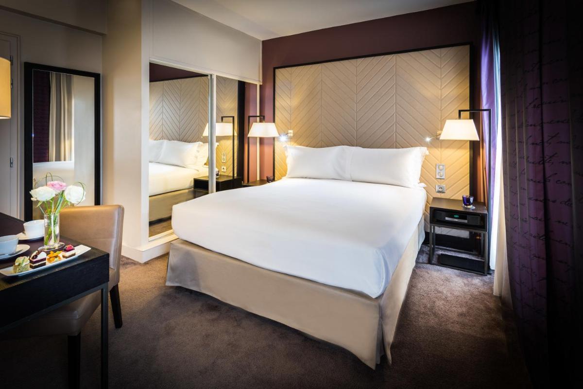 Un ou plusieurs lits dans un hébergement de l'établissement Sofitel Strasbourg Grande Ile