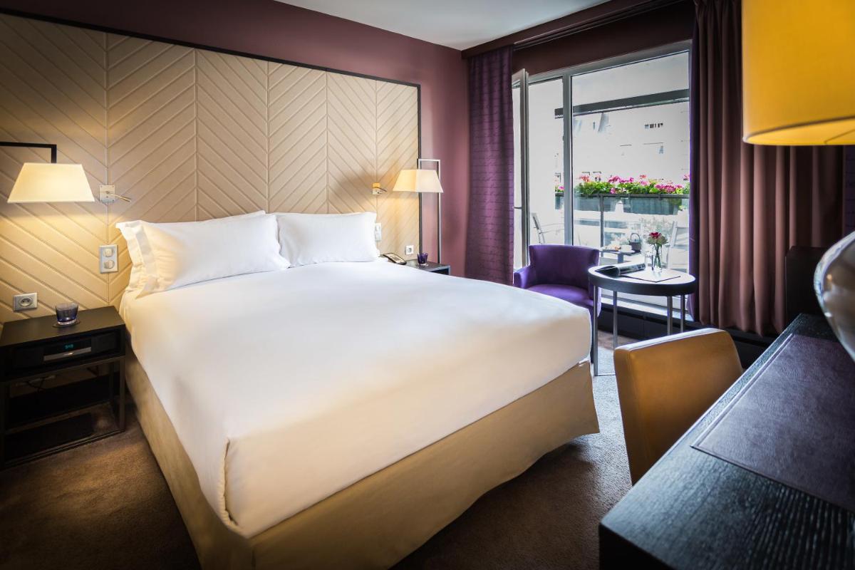 Un ou plusieurs lits dans un hébergement de l'établissement Sofitel Strasbourg Grande Ile