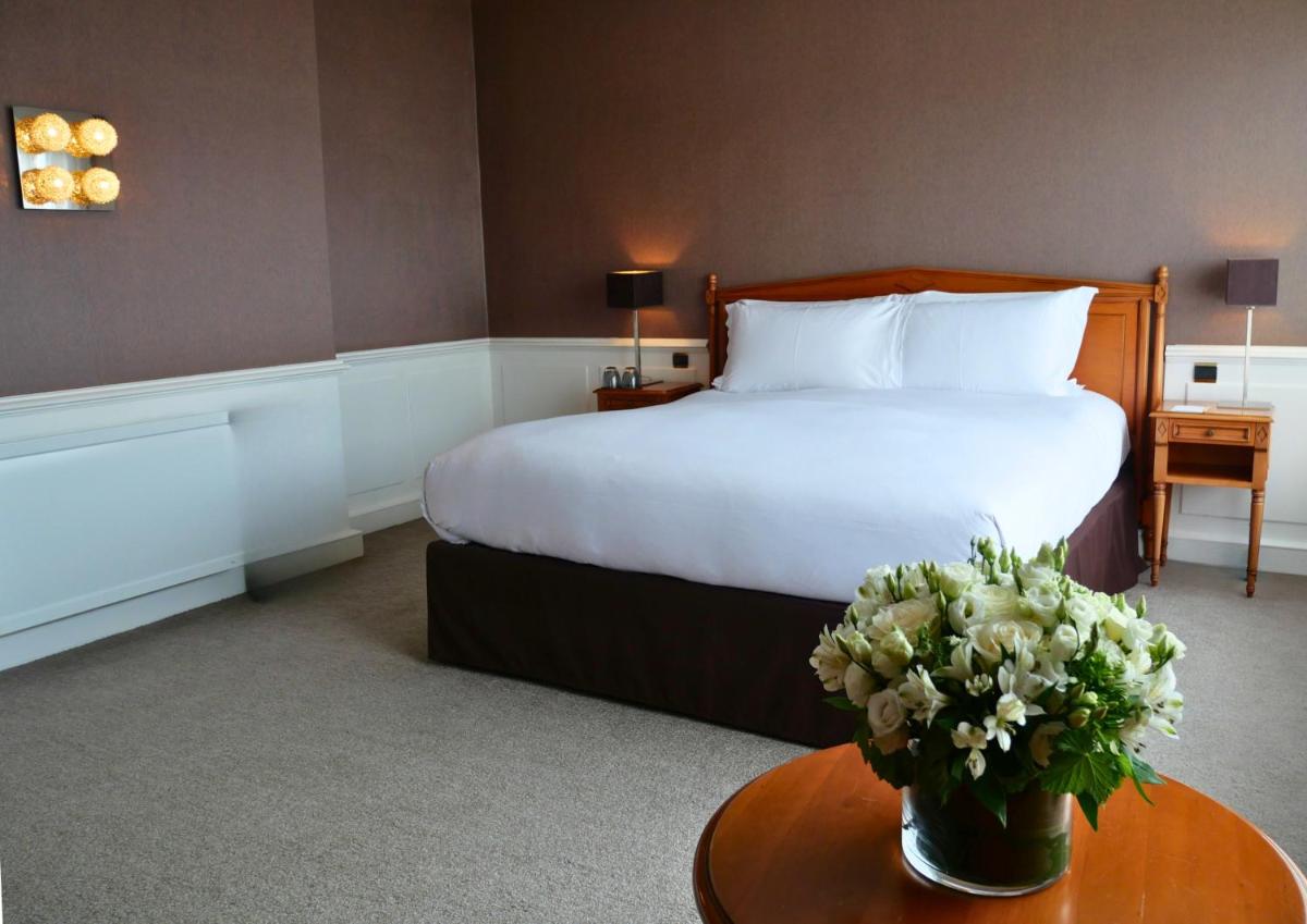 Un ou plusieurs lits dans un hébergement de l'établissement Sofitel Strasbourg Grande Ile