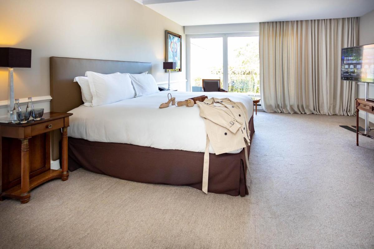 Un ou plusieurs lits dans un hébergement de l'établissement Sofitel Strasbourg Grande Ile