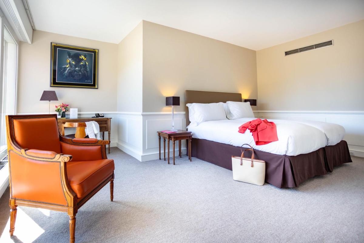 Un ou plusieurs lits dans un hébergement de l'établissement Sofitel Strasbourg Grande Ile