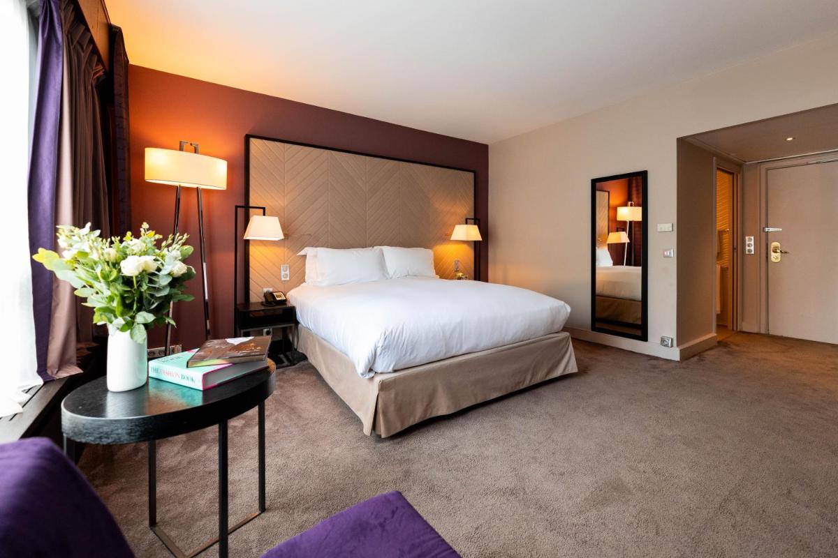 Un ou plusieurs lits dans un hébergement de l'établissement Sofitel Strasbourg Grande Ile