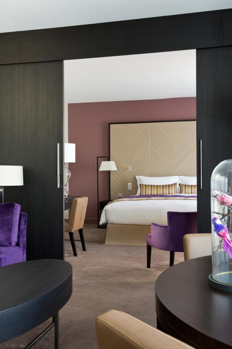 Un ou plusieurs lits dans un hébergement de l'établissement Sofitel Strasbourg Grande Ile