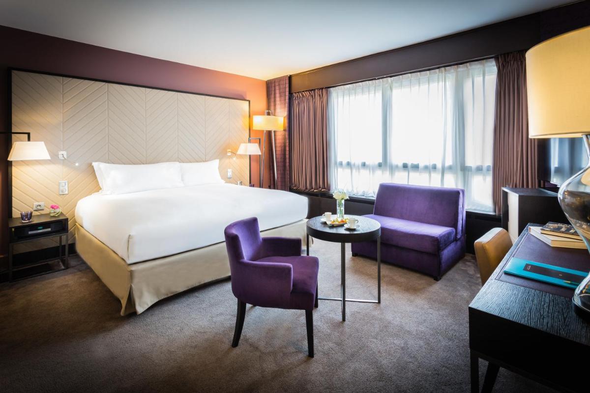Un ou plusieurs lits dans un hébergement de l'établissement Sofitel Strasbourg Grande Ile