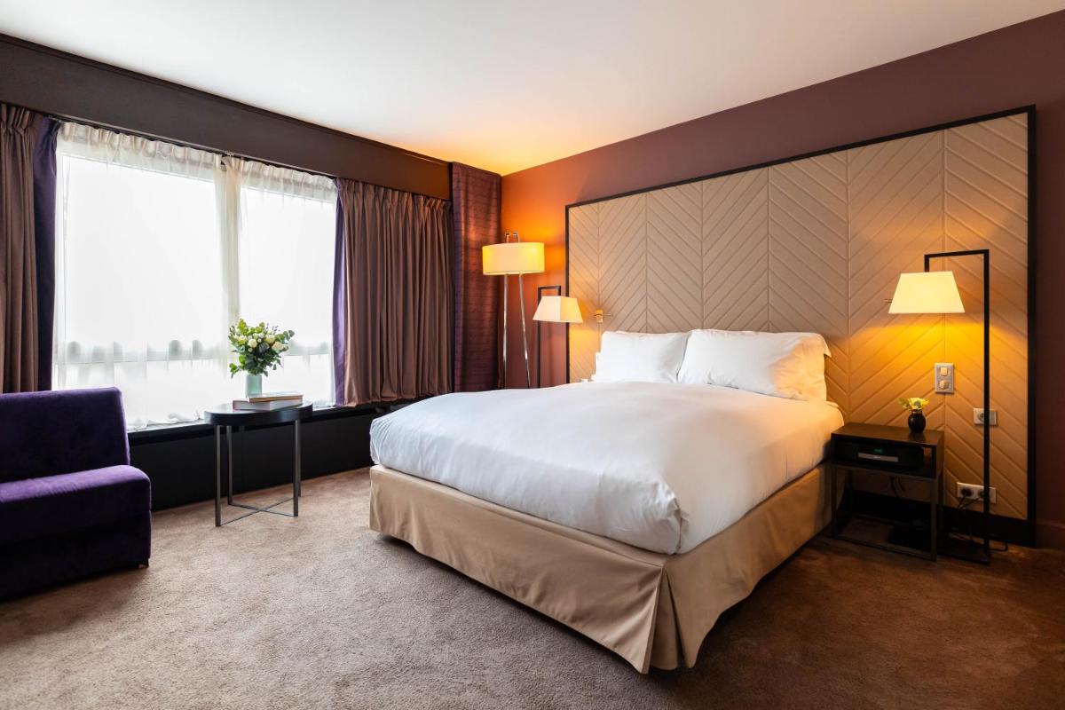 Un ou plusieurs lits dans un hébergement de l'établissement Sofitel Strasbourg Grande Ile