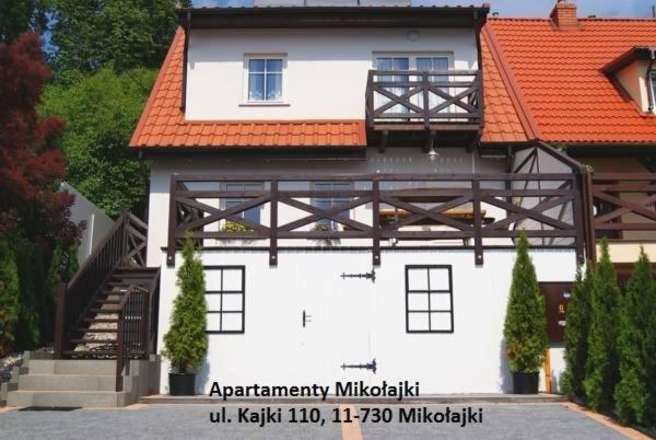 Apartamenty i pokoje Mikołajki - Housity