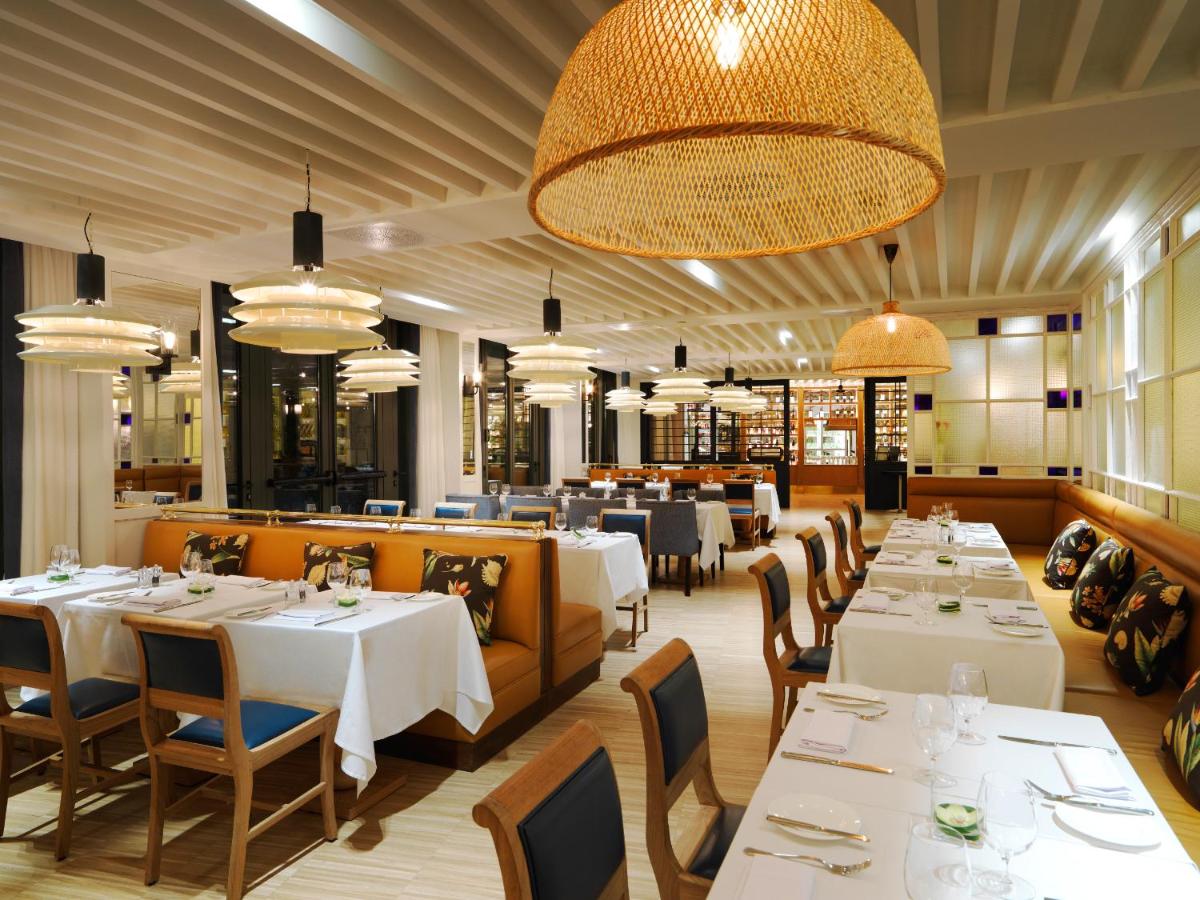 Un restaurante o sitio para comer en Hotel Camiral - The Leading Hotels of the World