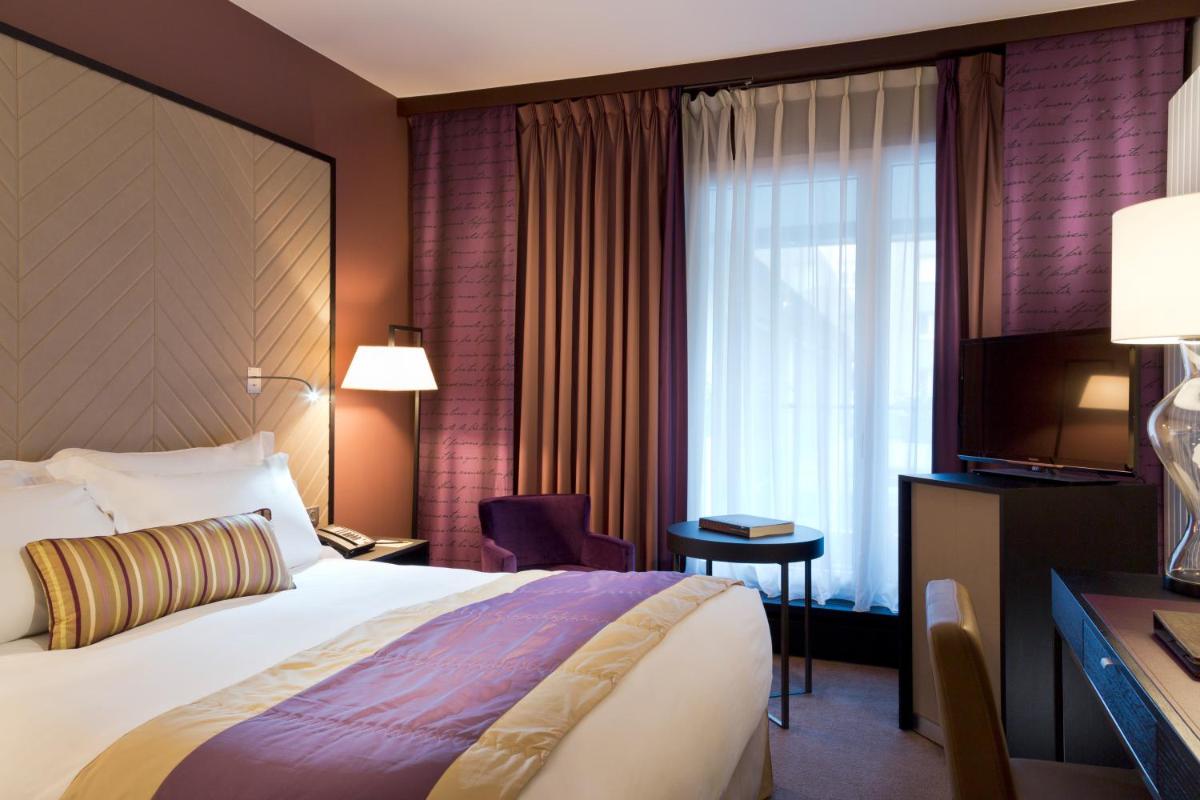 Un ou plusieurs lits dans un hébergement de l'établissement Sofitel Strasbourg Grande Ile
