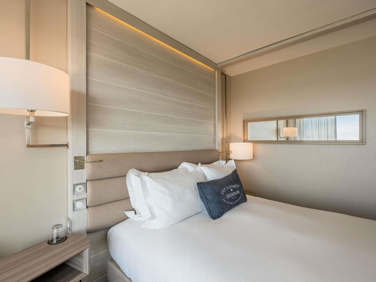 Un ou plusieurs lits dans un hébergement de l'établissement Sofitel Quiberon Thalassa sea & spa