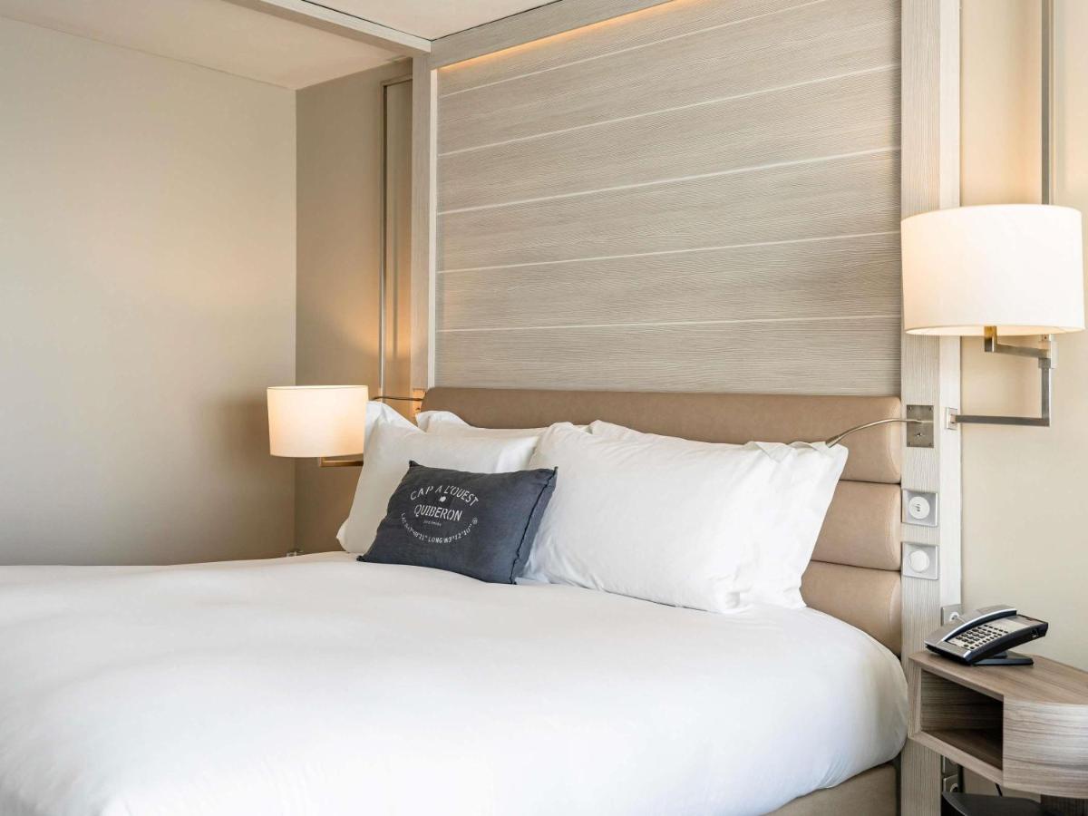 Un ou plusieurs lits dans un hébergement de l'établissement Sofitel Quiberon Thalassa sea & spa