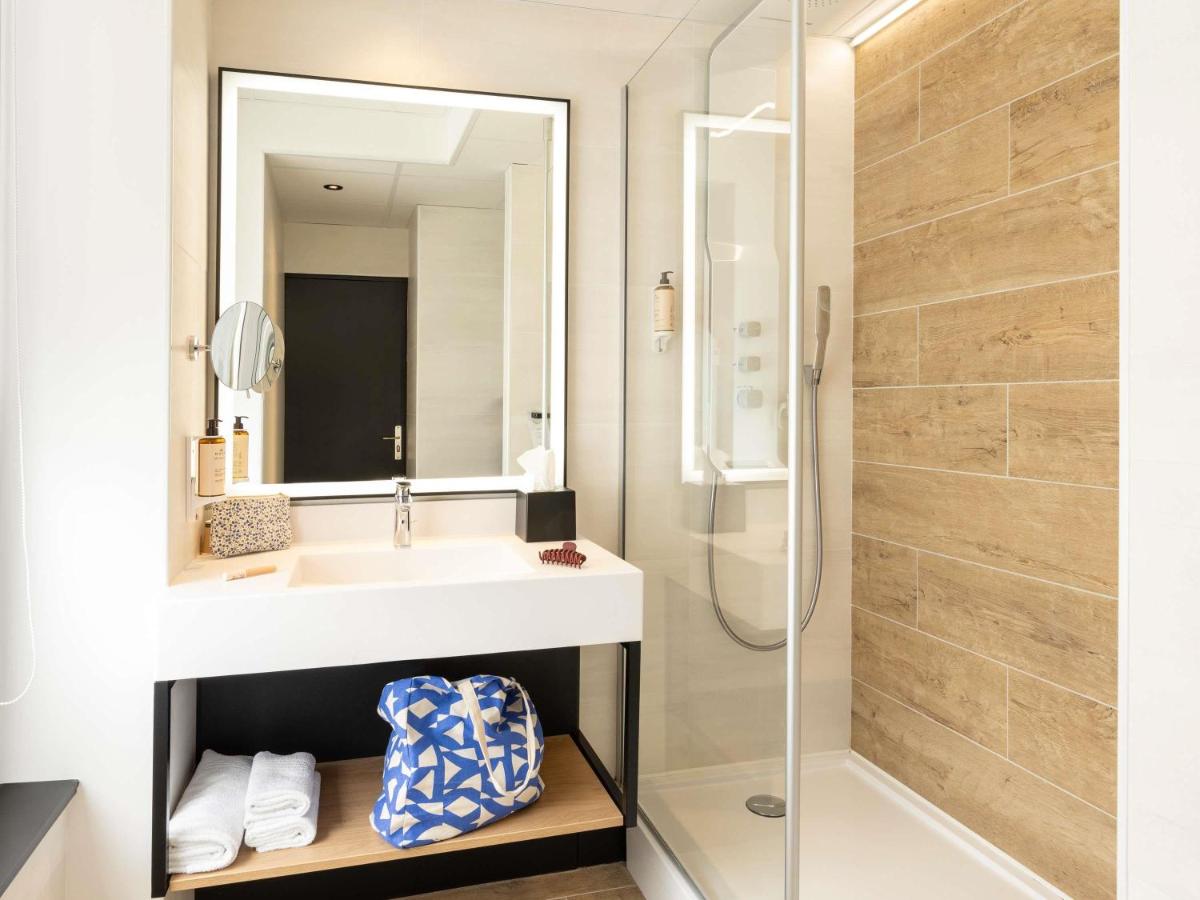 Salle de bains dans l'établissement Mercure Epinal Centre