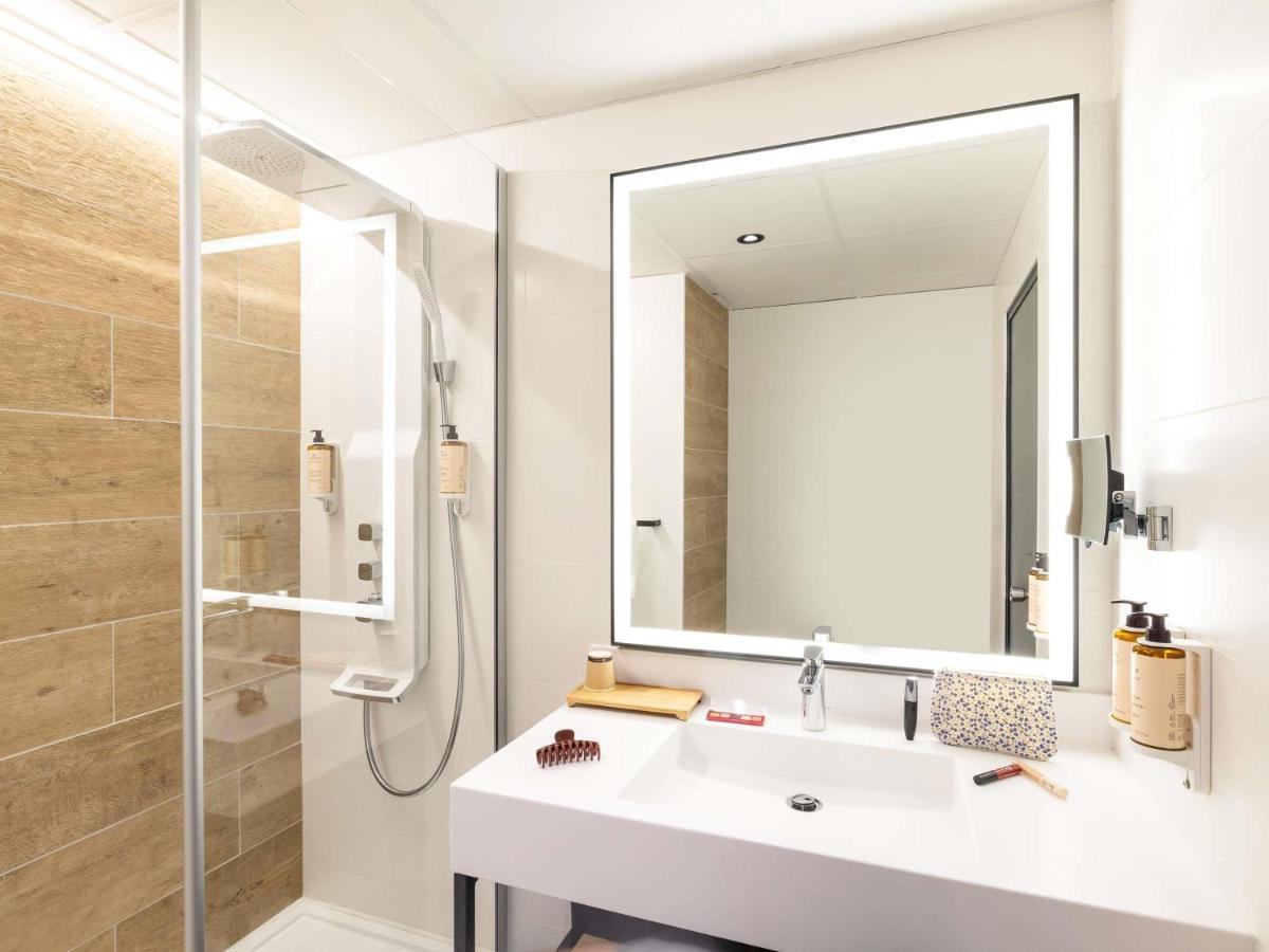 Salle de bains dans l'établissement Mercure Epinal Centre