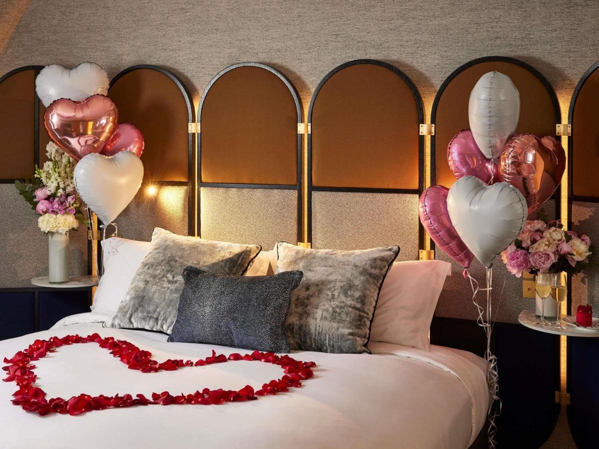 Un ou plusieurs lits dans un hébergement de l'établissement Sofitel Paris Baltimore Tour Eiffel