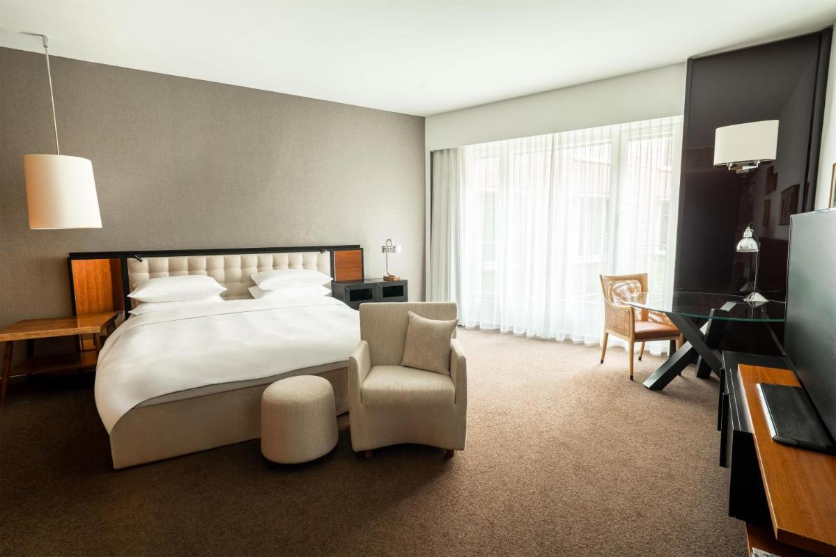 Ein Bett oder Betten in einem Zimmer der Unterkunft Grand Hyatt Berlin