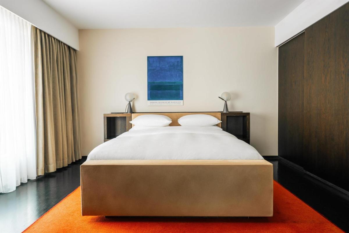 Ein Bett oder Betten in einem Zimmer der Unterkunft Grand Hyatt Berlin