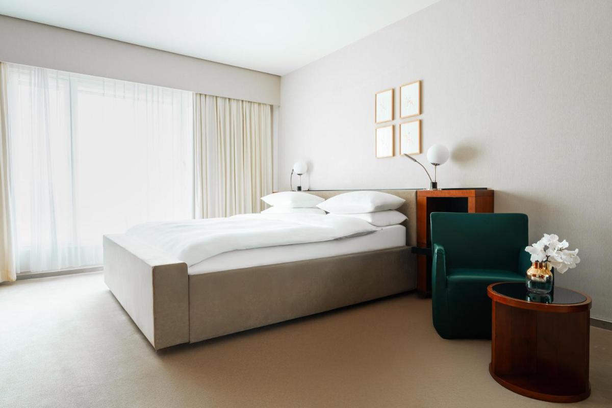 Ein Bett oder Betten in einem Zimmer der Unterkunft Grand Hyatt Berlin