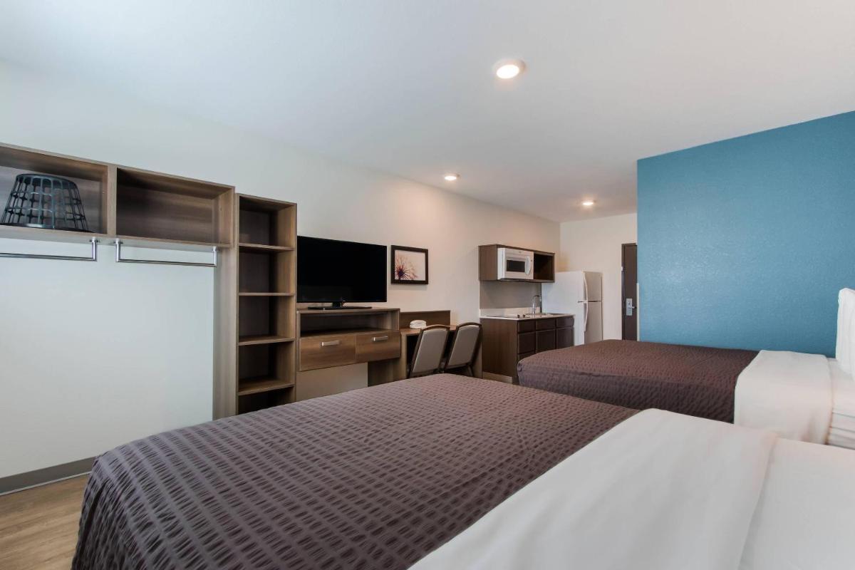 WoodSpring Suites Tamarac - Housity