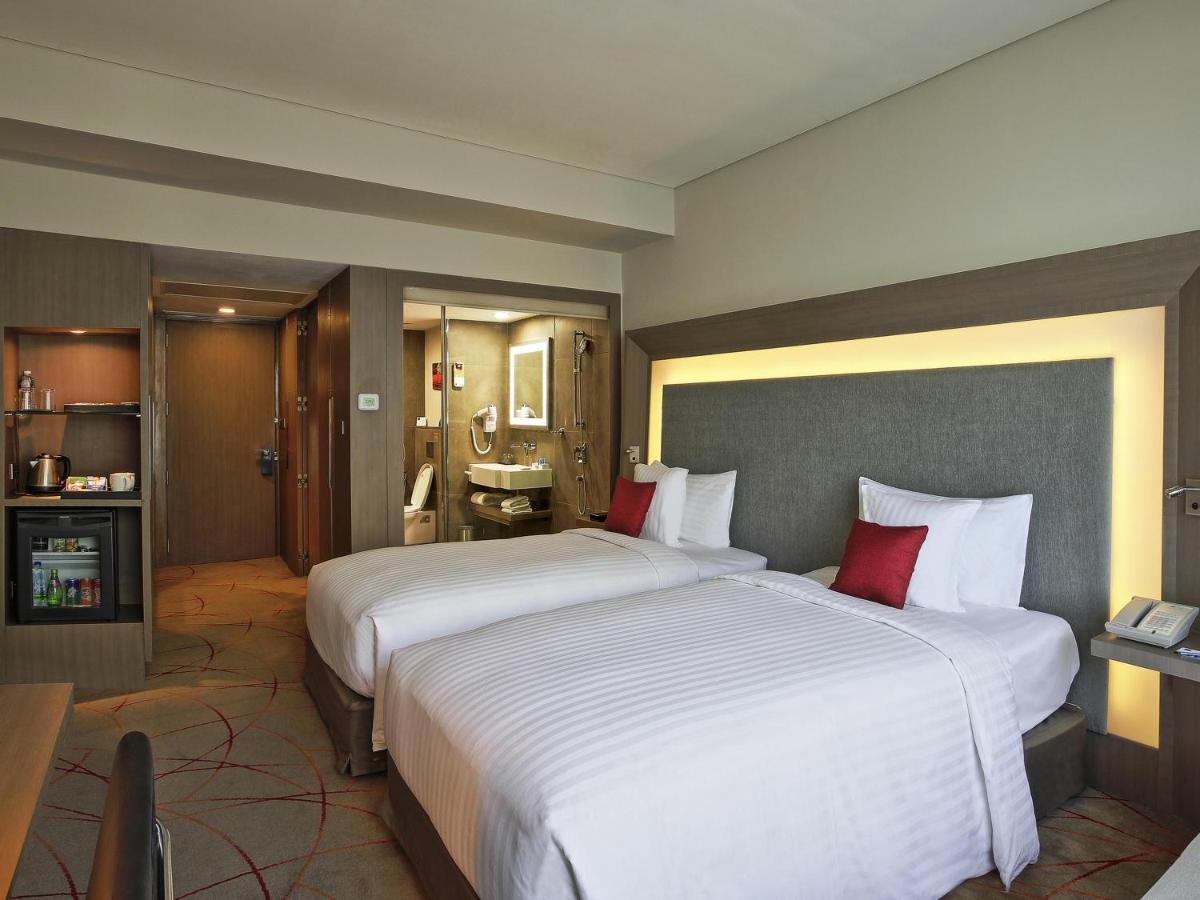 Cama o camas de una habitación en Novotel Kolkata Hotel and Residences