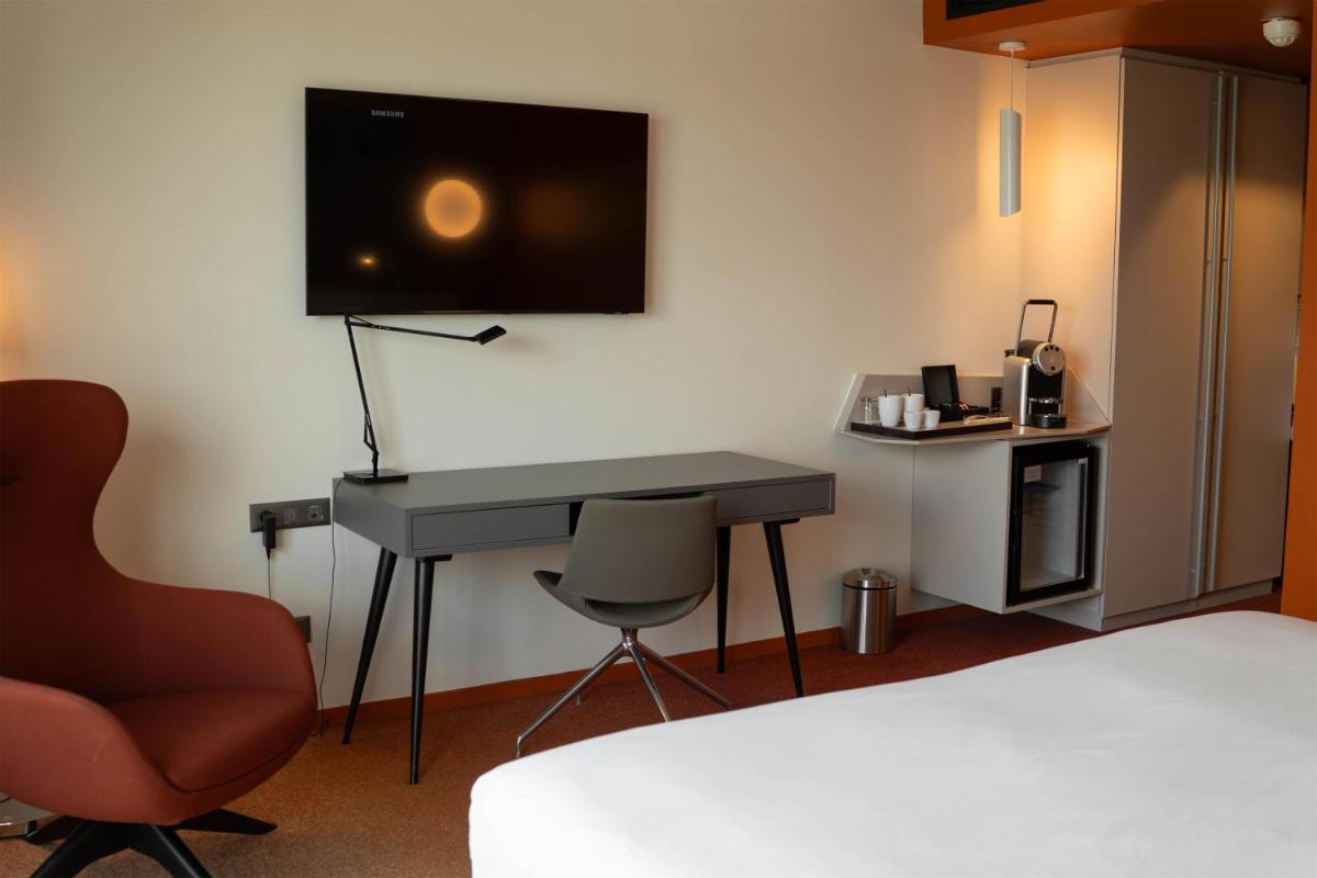 Télévision ou salle de divertissement dans l'établissement Radisson Blu Hotel Bordeaux