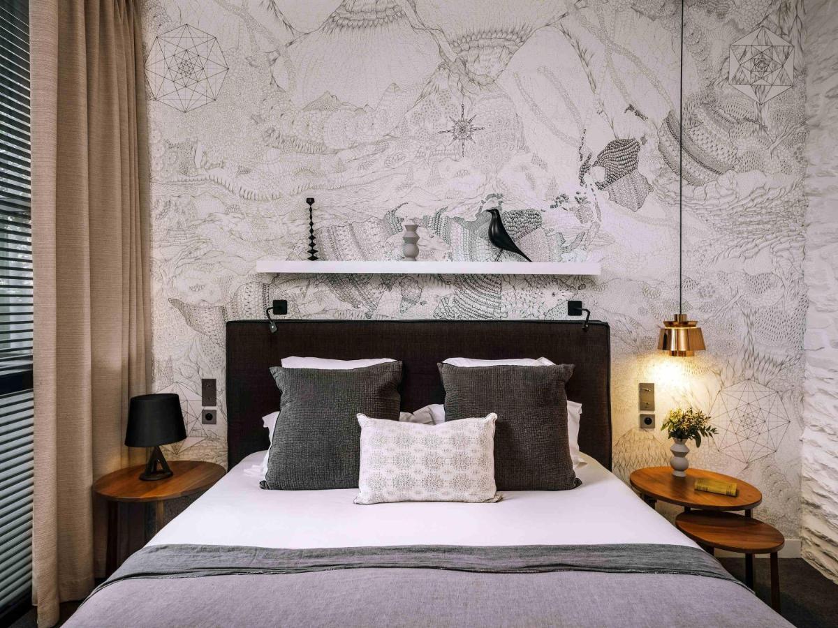 Un ou plusieurs lits dans un hébergement de l'établissement Balthazar Hotel & Spa Rennes - MGallery Collection