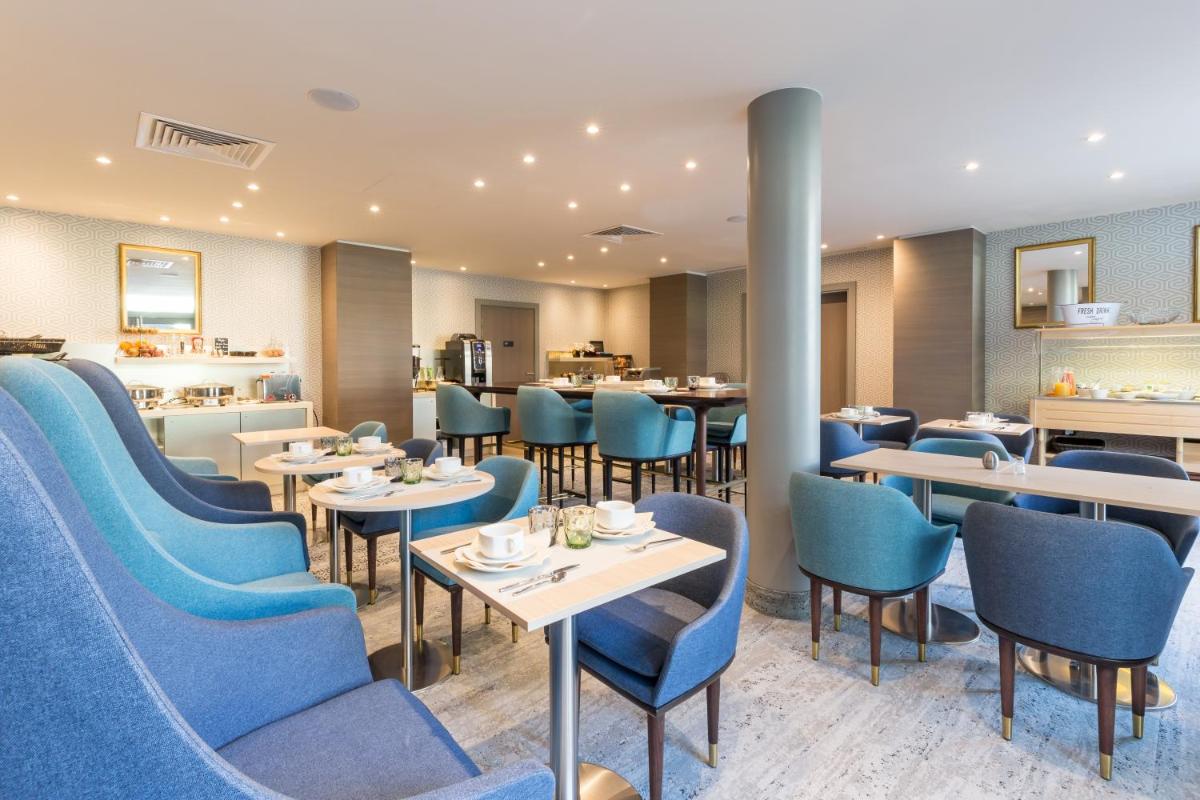 Coin salon dans l'établissement Résidence Pierre & Vacances Premium Presqu'Ile de la Touques