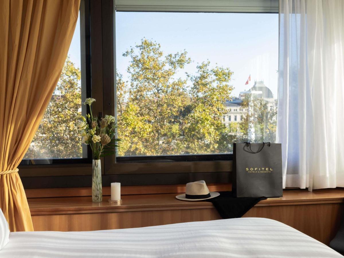 Un ou plusieurs lits dans un hébergement de l'établissement Sofitel Lyon Bellecour