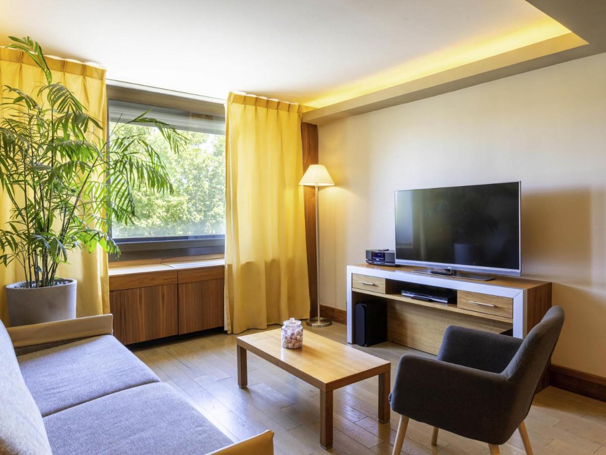 Télévision ou salle de divertissement dans l'établissement Sofitel Lyon Bellecour