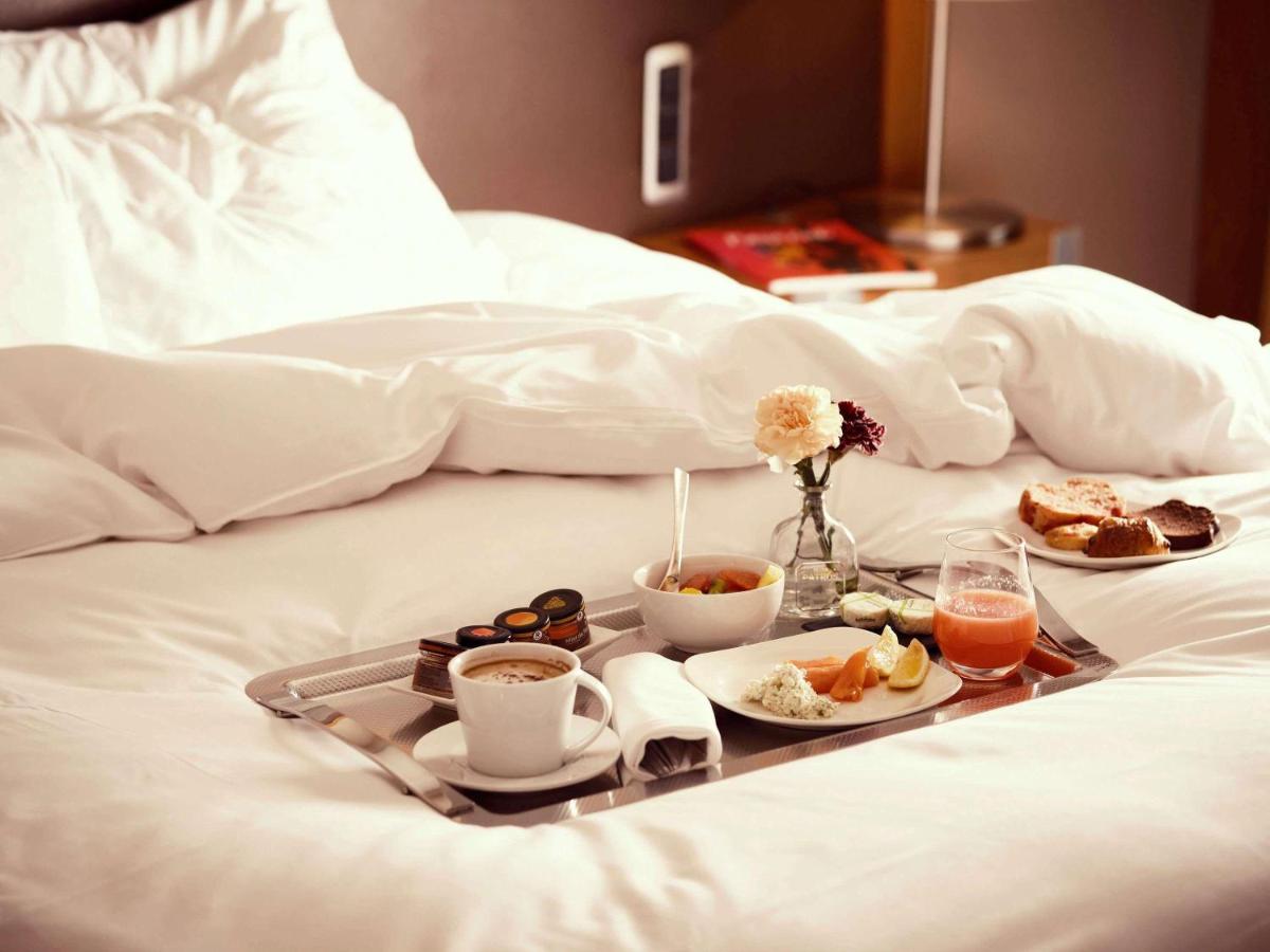 Un ou plusieurs lits dans un hébergement de l'établissement Sofitel Lyon Bellecour