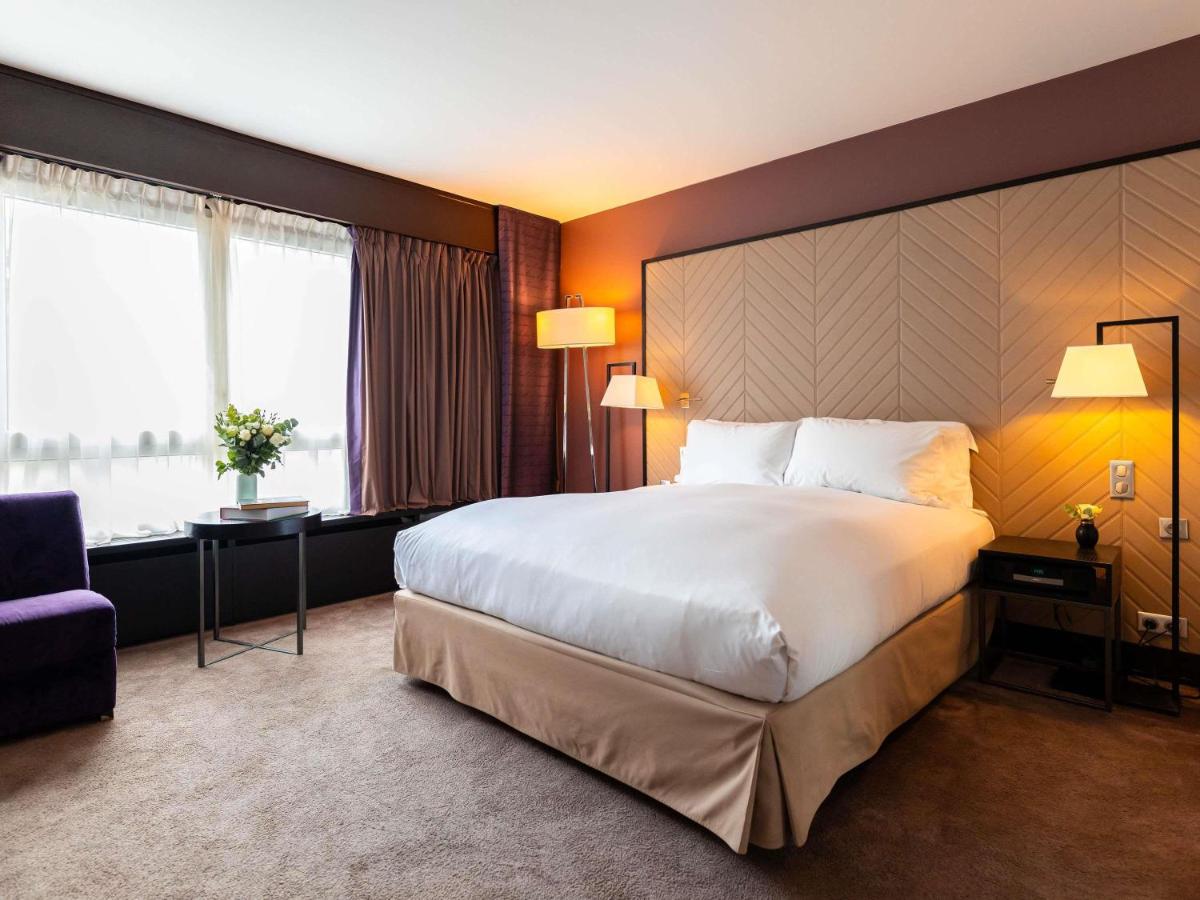 Un ou plusieurs lits dans un hébergement de l'établissement Sofitel Strasbourg Grande Ile