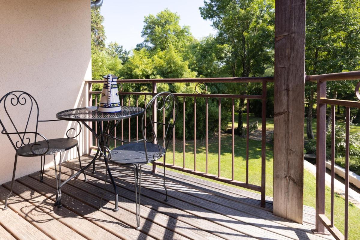Balcon ou terrasse dans l'établissement Le Moulin de Mitou