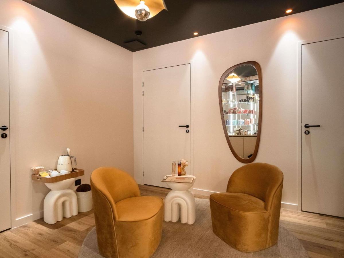 Coin salon dans l'établissement Mercure Saint-Lary