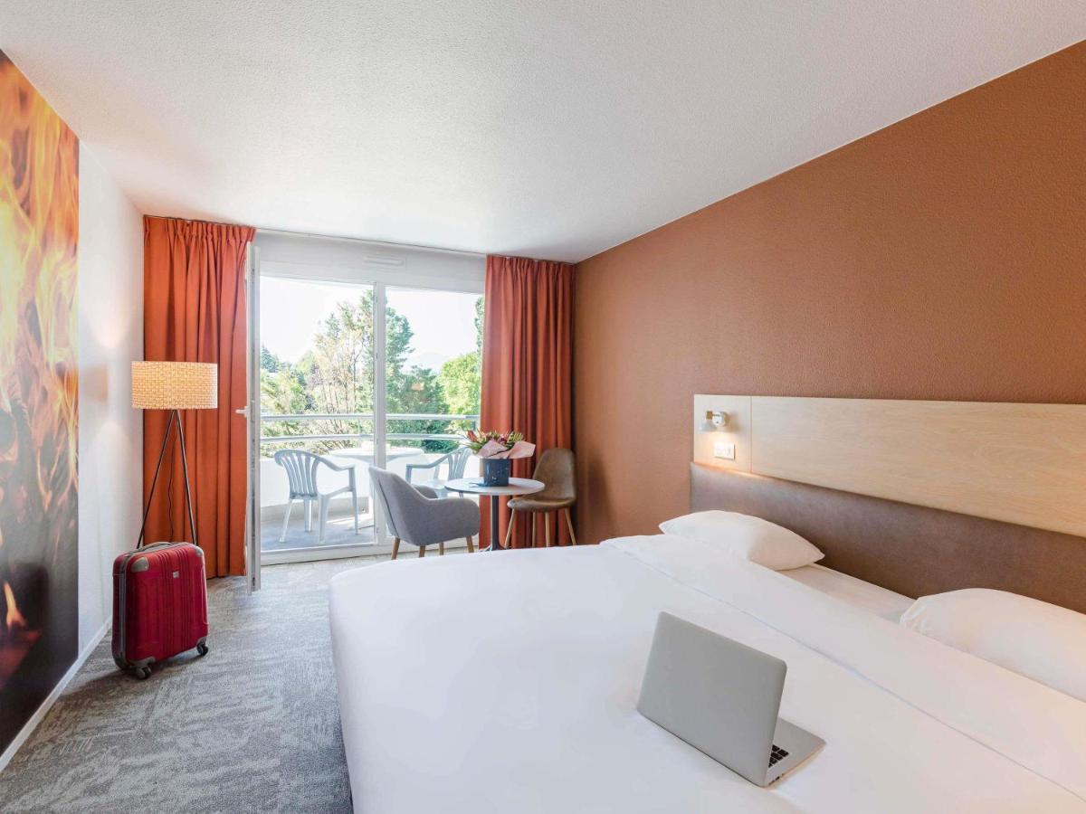 Un ou plusieurs lits dans un hébergement de l'établissement ibis Styles Aix les Bains Domaine de Marlioz