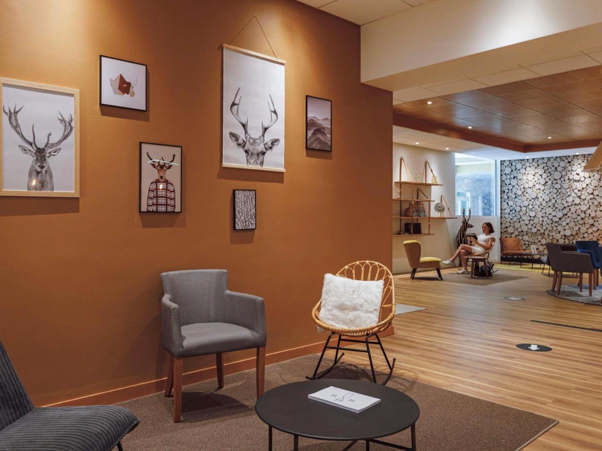 Coin salon dans l'établissement ibis Styles Aix les Bains Domaine de Marlioz