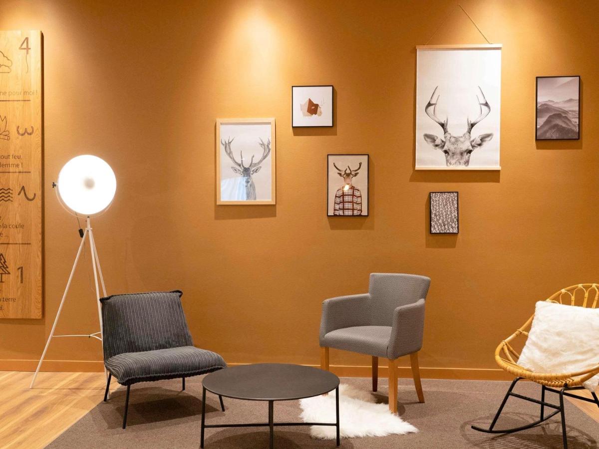 Coin salon dans l'établissement ibis Styles Aix les Bains Domaine de Marlioz