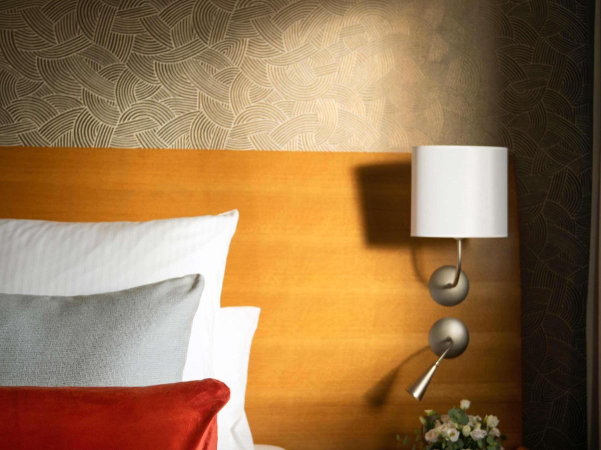 Un ou plusieurs lits dans un hébergement de l'établissement Parc Beaumont Hôtel & Spa Pau - MGallery Collection