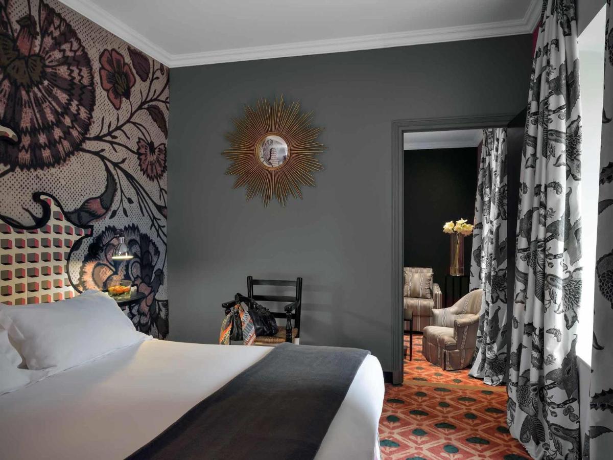 Un ou plusieurs lits dans un hébergement de l'établissement Jules César Hotel & Spa Arles - MGallery Collection