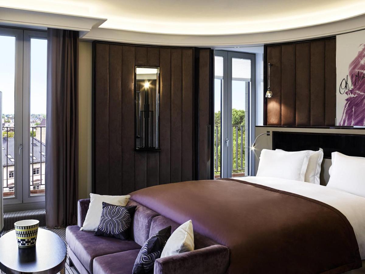 Ein Bett oder Betten in einem Zimmer der Unterkunft Sofitel Frankfurt Opera