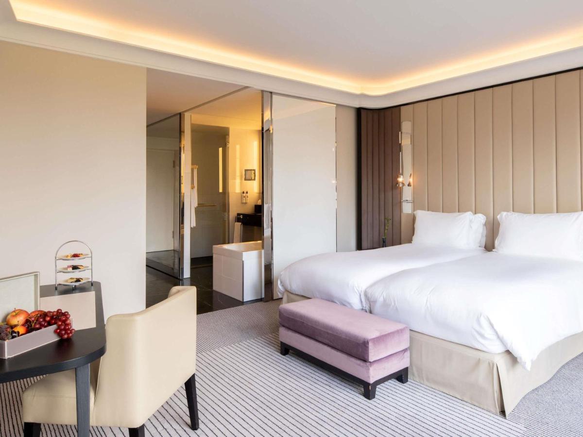 Ein Bett oder Betten in einem Zimmer der Unterkunft Sofitel Frankfurt Opera
