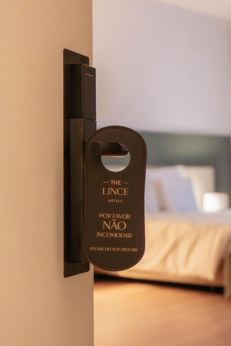 Uma cama ou camas num quarto em The Lince Braga