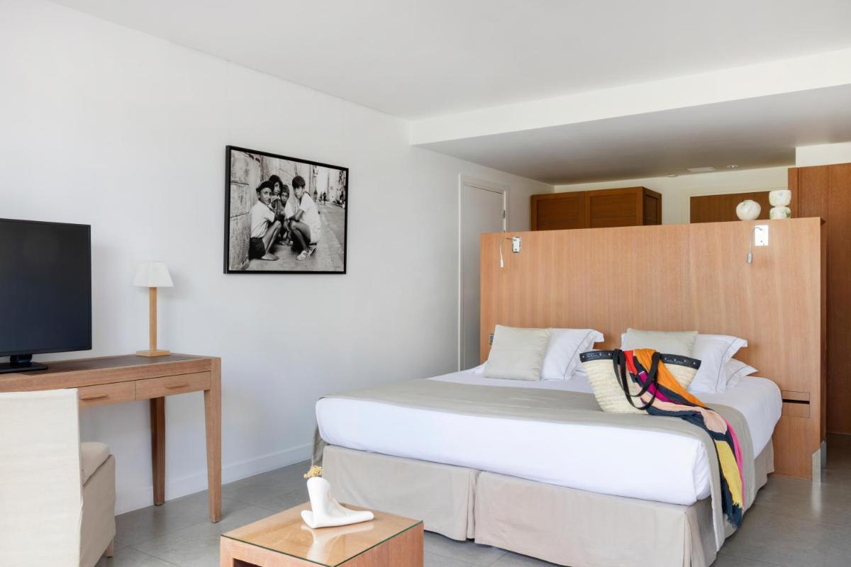 Un ou plusieurs lits dans un hébergement de l'établissement Casadelmar