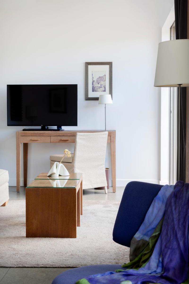 Télévision ou salle de divertissement dans l'établissement Casadelmar